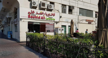 Rashid Ali Hassan Madina Zayed outside